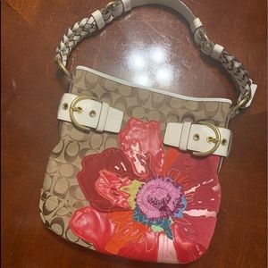 Coach purse with beautiful flower on front!